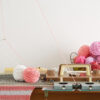 A table with a sewing machine and the best yarn for knitting machine.